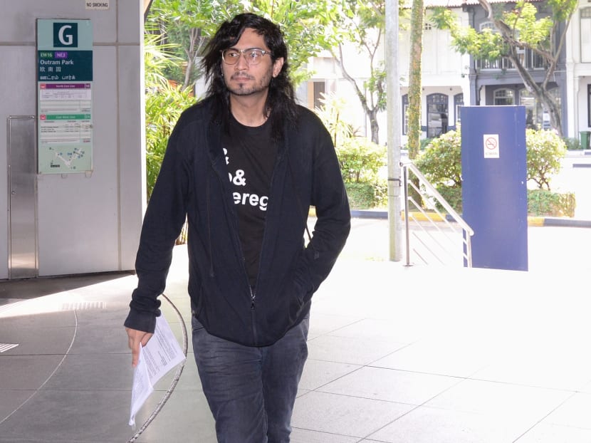 Sean Francis Han, one of the individuals who participated in the protest on board a MRT train, arriving at the Police Cantonment Complex for questioning, on June 12, 2017. Photo: Robin Choo/TODAY