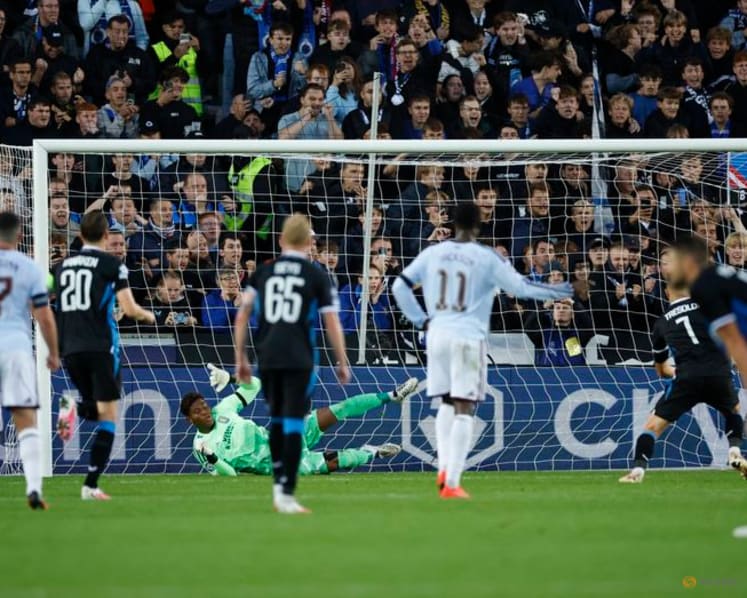 Torres helps Villa hold off Brugge, Marin fires AEK to victory