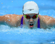 China's 13-year-old Yu cruises as Asian Games swimming begins