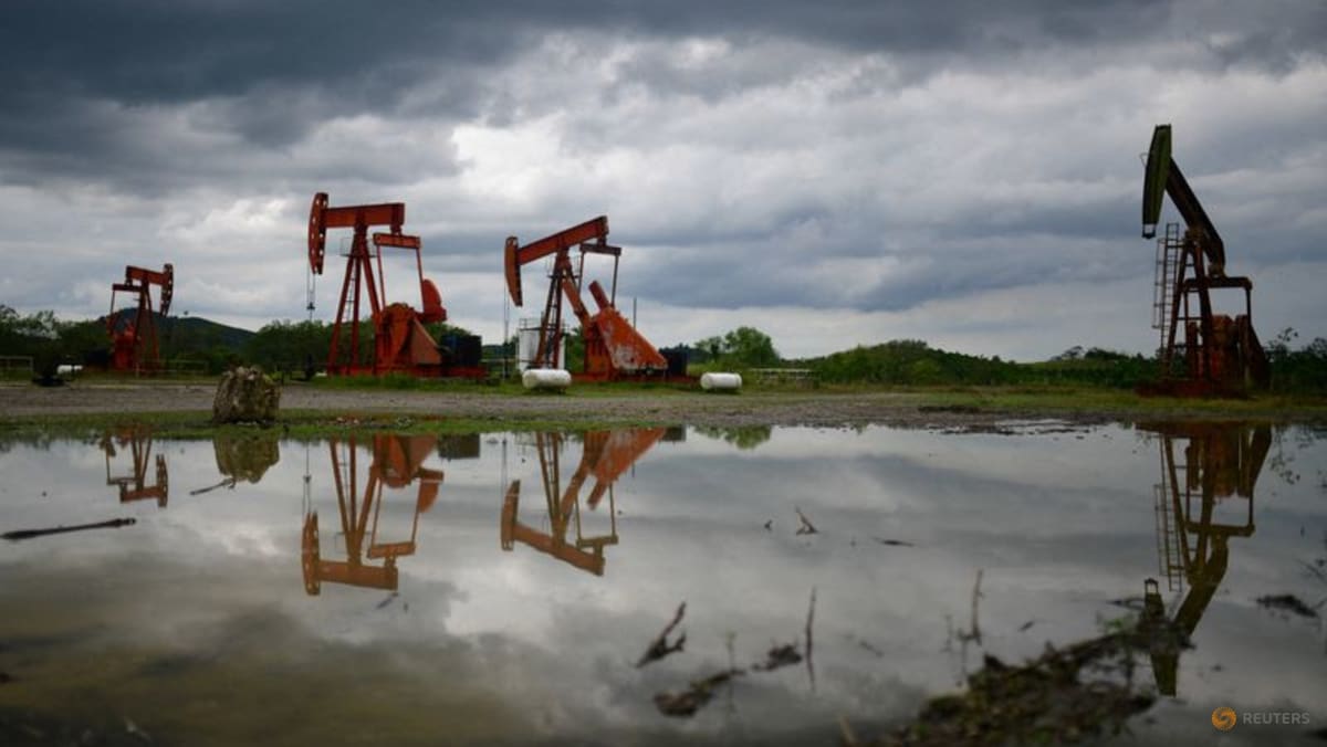 Oil rises slightly as investors await clarity afte