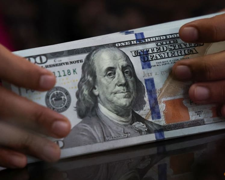 US dollar to retain strength, yen intervention no game changer: Reuters poll