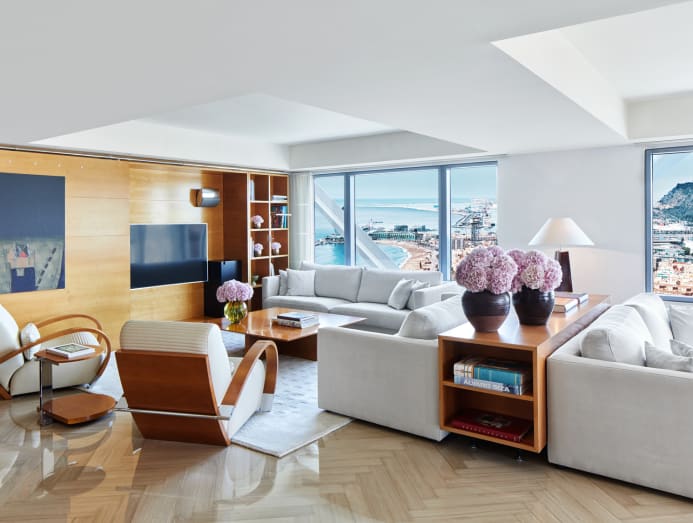 View of A Light Penthouse Apartment with Built-In Bookshelves