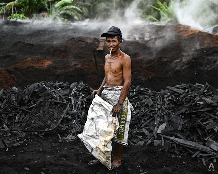Malaysia's charcoal workers who risk life and health to do the work shunned by most
