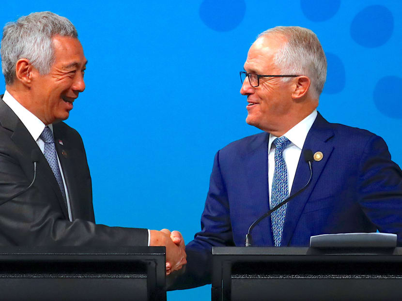 Singapore's Prime Minister Lee Hsien Loong and Australian Prime Minister Malcolm Turnbull shaking hands during their media conference during the one-off summit of the 10-member Asean in Sydney, Australia on March 18, 2018. Photo: Reuters