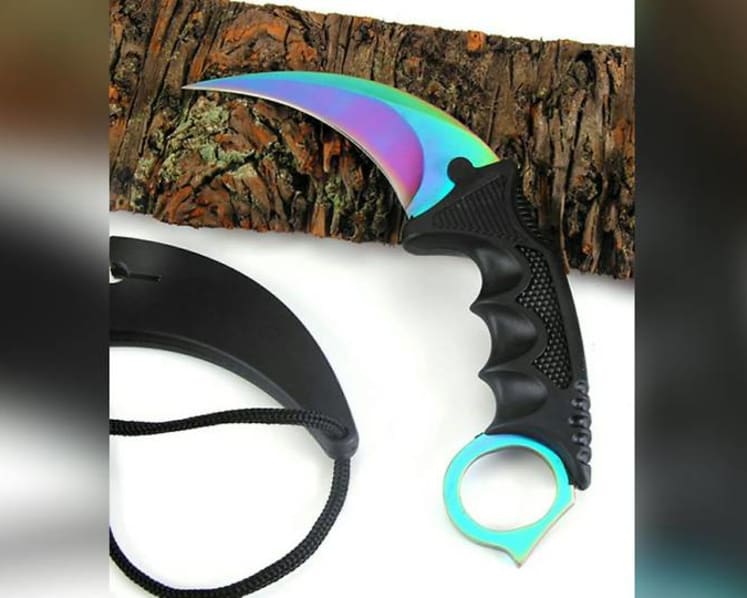 Police question shop staff over sale of karambit knife