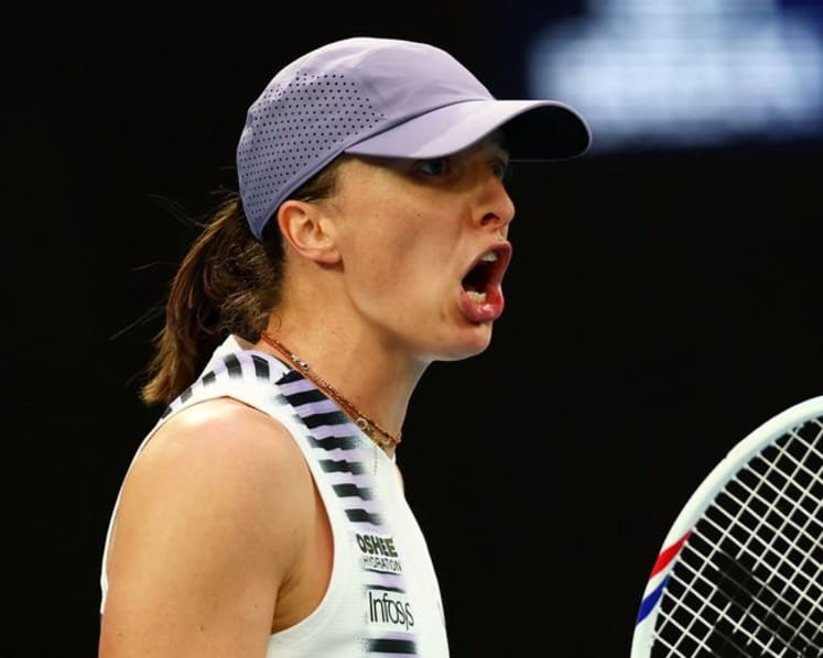 Swiatek fends off dogged Yuan to reach Australian Open second round