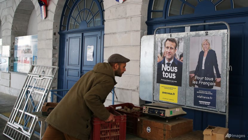 Voting opens in France runoff between Macron and Le Pen