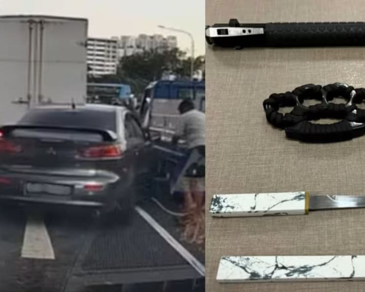 Driver arrested after attempting to force his way out of traffic in Marsiling; weapons found in his car