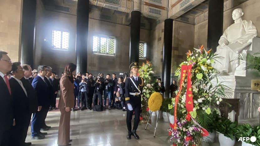 Taiwan opposition leader pledges reconciliation at memorial for founding father in China