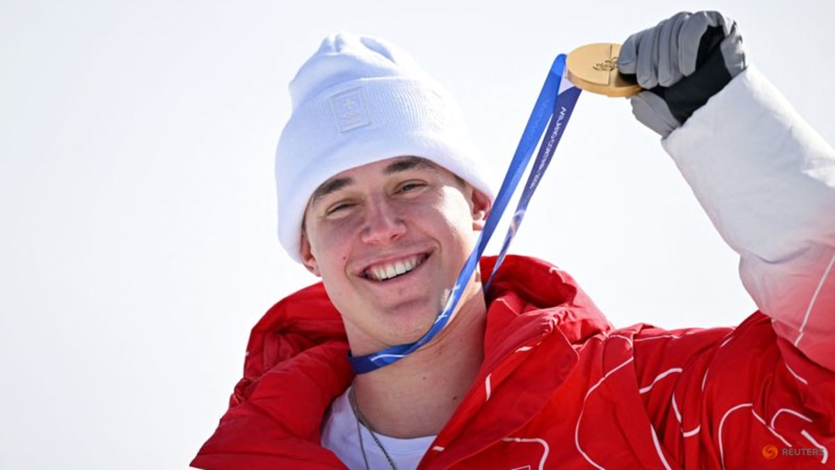 Alpine skiing-Swiss upstart Von Allmen stuns Odermatt to win downhill gold