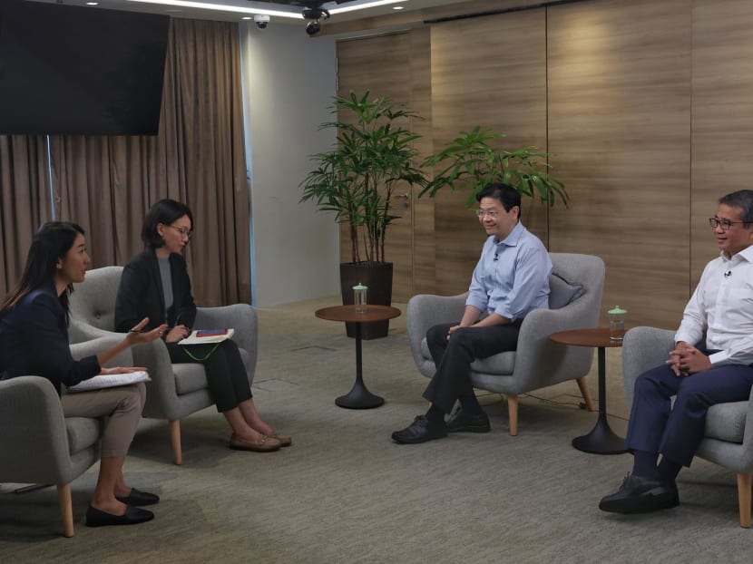 DPM Lawrence Wong (second from right) and Mr Edwin Tong at the interview with CNA. DPM Lawrence Wong (second from right) and Mr Edwin Tong at the interview with CNA.