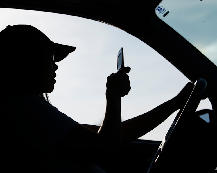Drivers holding phones while driving may be punished under proposed changes to road traffic law