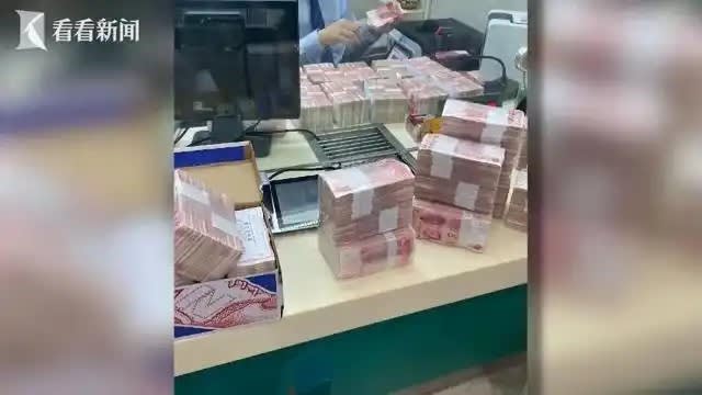 私吞拆迁赔款拒还兄弟姐妹 中国女子把百万元现金藏床底