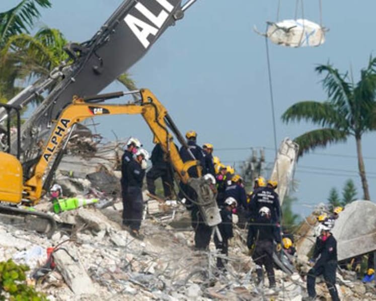 Florida condominium demolition opens up fresh rubble in collapse search