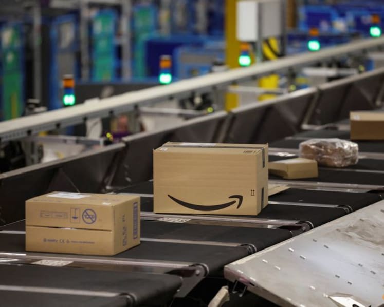 Amazon unveils new AI warehouse robot in $12 billion Europe push