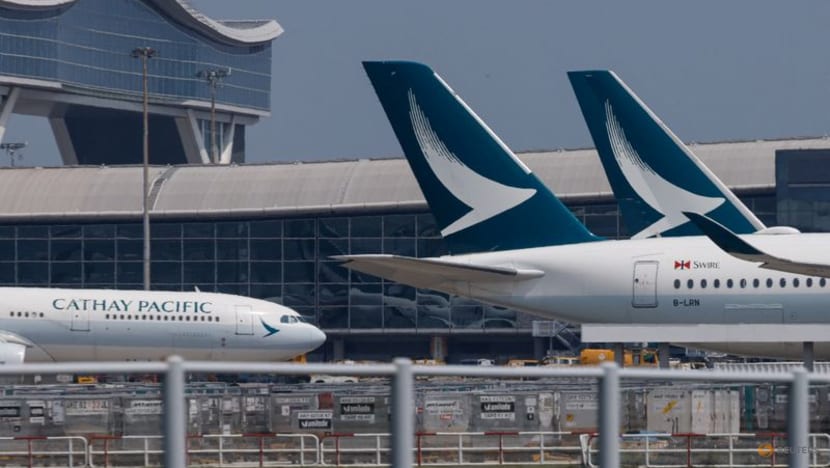 Cathay Pacific says profit drops 15% on lower fares, declares dividend Cathay Pacific says profit drops 15% on lower fares, declares dividend