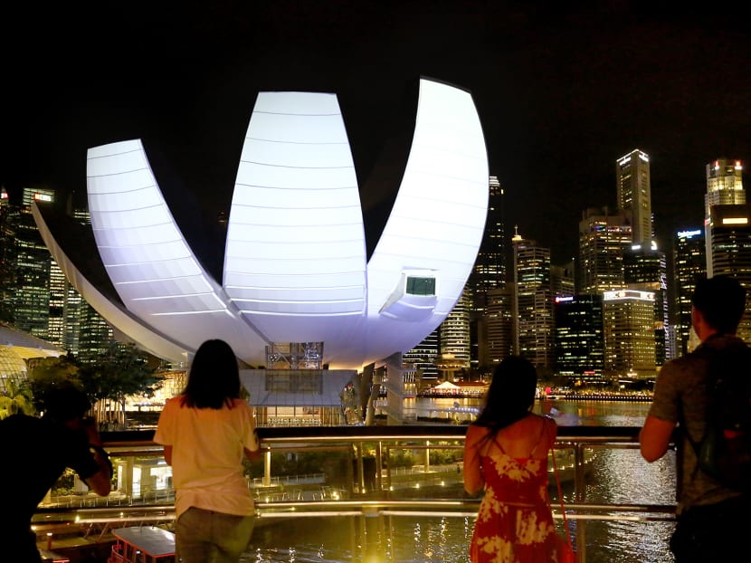 Light projection on the ArtScience Museum facade in 2018. The museum said that it will be closed from March 19, 2020 until further notice.