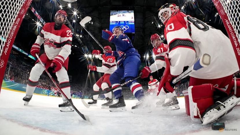 Ice hockey-Slovakia win group, US beat Denmark, Finland, Latvia notch wins