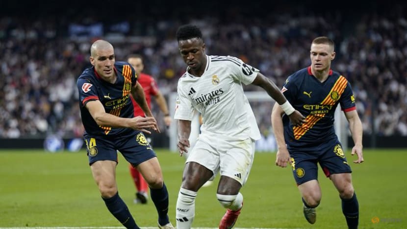 Real beat Girona 2-0 to move level on points with leaders Barcelona