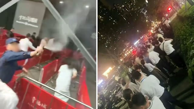 深圳楼盘大降价引通宵排队抢购 人潮失控保安喷辣椒水驱赶