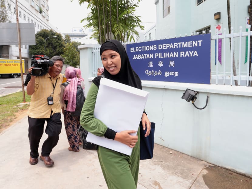 Potential candidates arrive at the Elections Department
