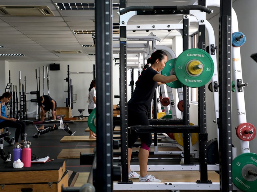 Gym users at Genesis Gym at Katong Shopping Centre, on July 21, 2021.