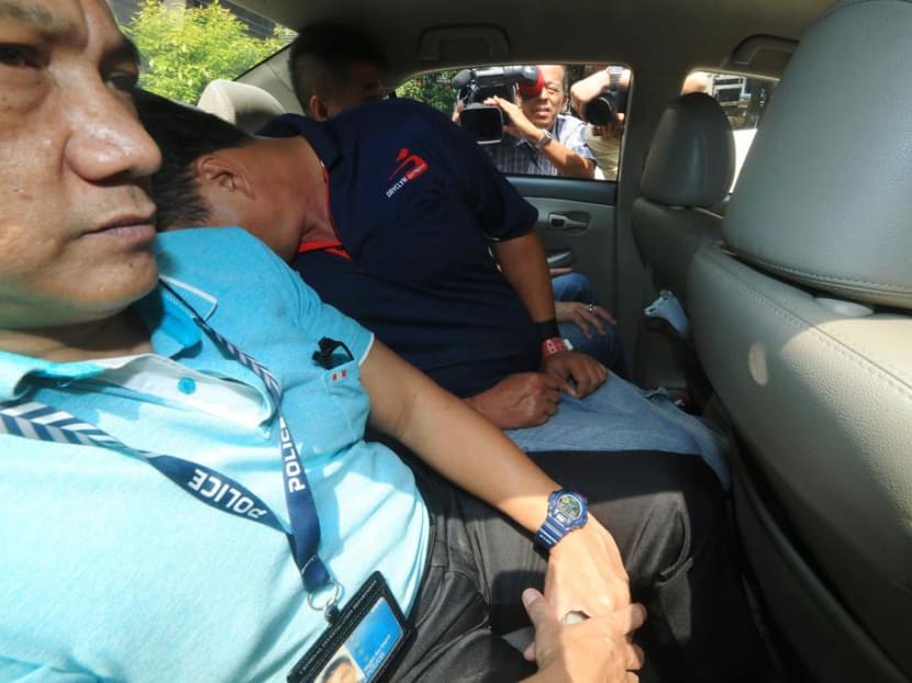 Leslie Khoo Kwee Hock (second from left in car) outside court on July 21, 2016. He pleads not guilty to murdering his lover, engineer Cui Yajie who was from Tianjin, China and was working in Singapore.