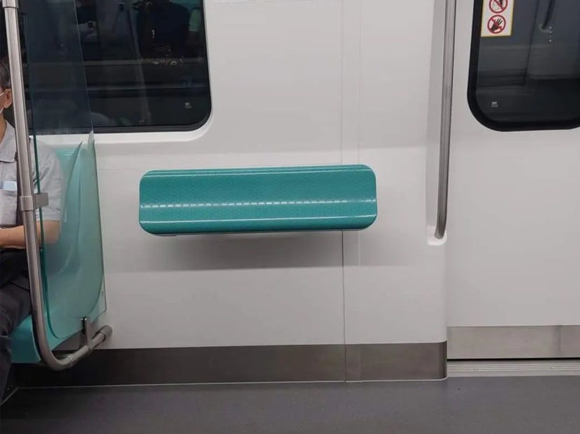 A view of an ergonomic perch "seat" for standing passengers in newer MRT trains. A view of an ergonomic perch "seat" for standing passengers in newer MRT trains.