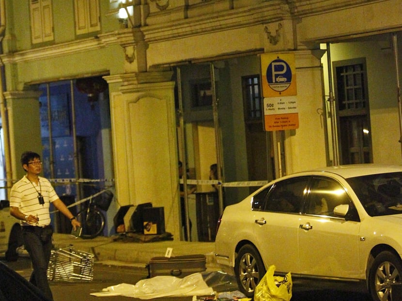 Legless body found in bloody suitcase at Syed Alwi Road