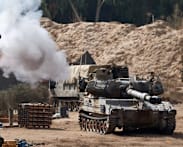 Tanks thrust deeper into Gaza, medics say many injured trapped