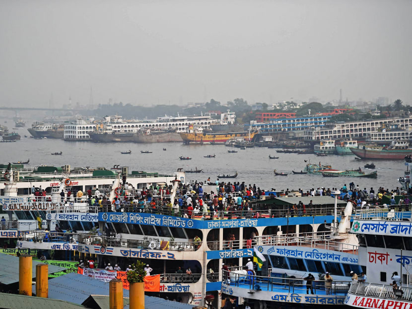 People cram on ferries to travel back to their homes in Dhaka, Bangladesh on April 4, 2021.