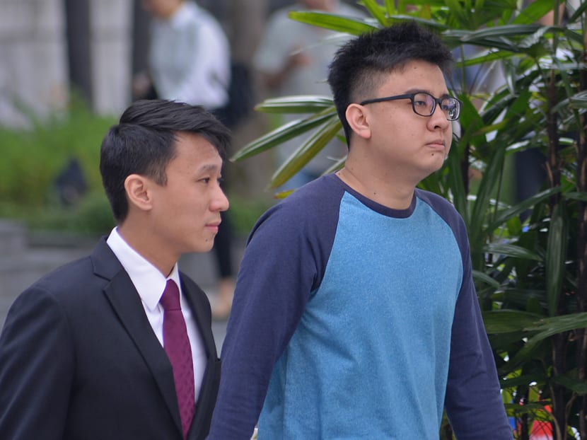 Yang Kaiheng (right) arriving at the State Court with his lawyer on June 22. Photo: Robin Choo/TODAY