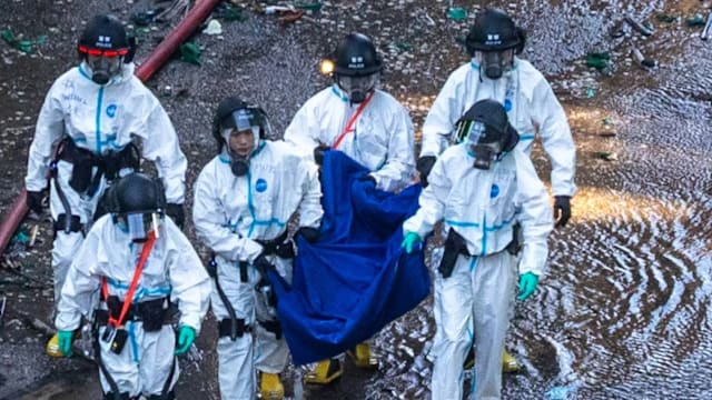 总警司交代死伤数度哽咽 部分遗体成灰烬难移出