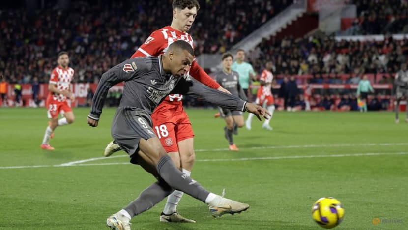 Real Madrid close on leaders Barcelona with 3-0 win at Girona