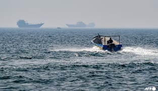 Iranian gunboat fires at container off Oman, ship off Iran also targeted