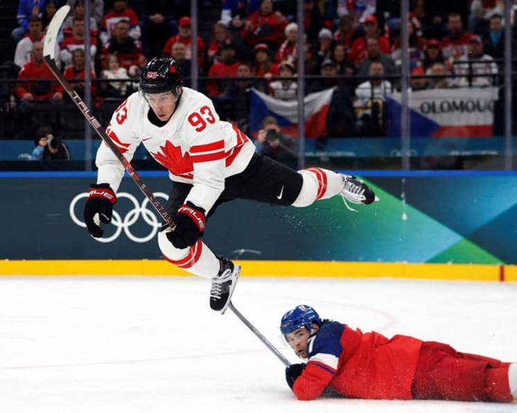 Ice hockey-Canada blank Czechs, US overpower Latvia, wins for Swiss and Germany