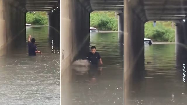 马国四警员冒险进淹水隧道 救出受困司机获网赞