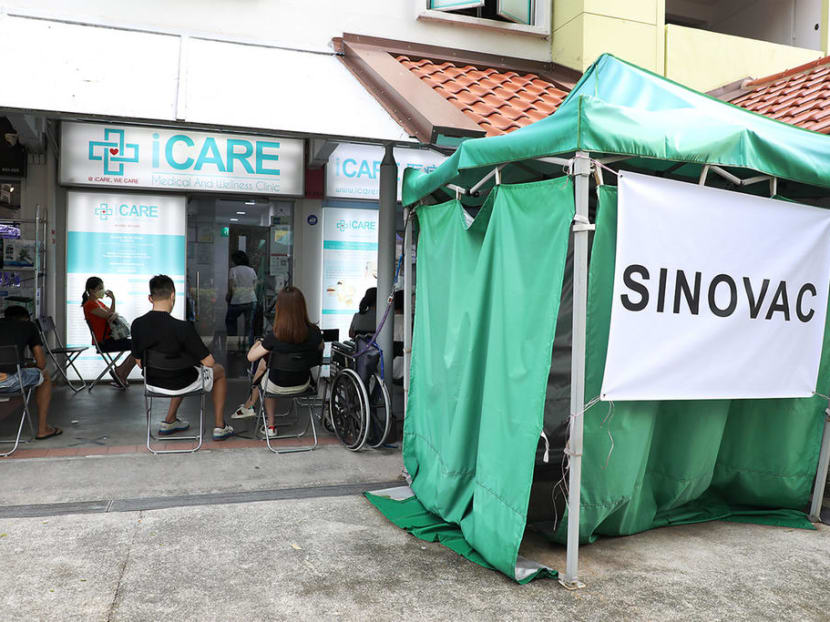 People waiting to get the Sinovac Covid-19 vaccine at a clinic in June 2021. People waiting to get the Sinovac Covid-19 vaccine at a clinic in June 2021.
