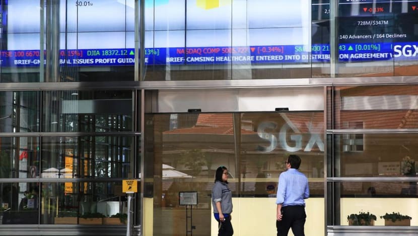 Investors urged to stay on the sidelines, as STI sees largest single-day drop in over 10 years