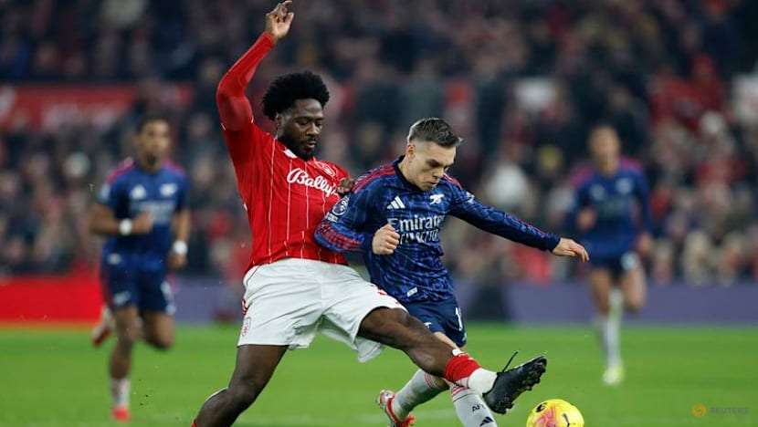 Arsenal frustrated by feisty Forest but move seven points clear at top