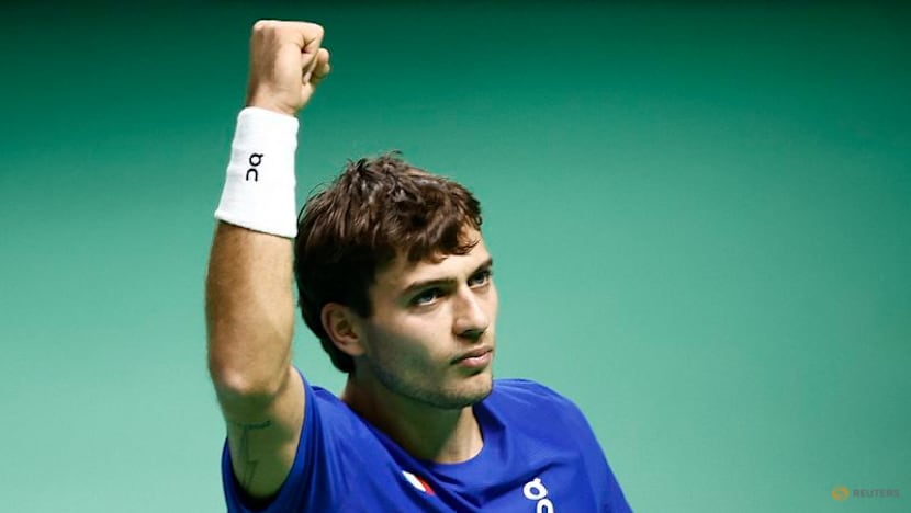 Battling Cobolli sends holders Italy into Davis Cup final