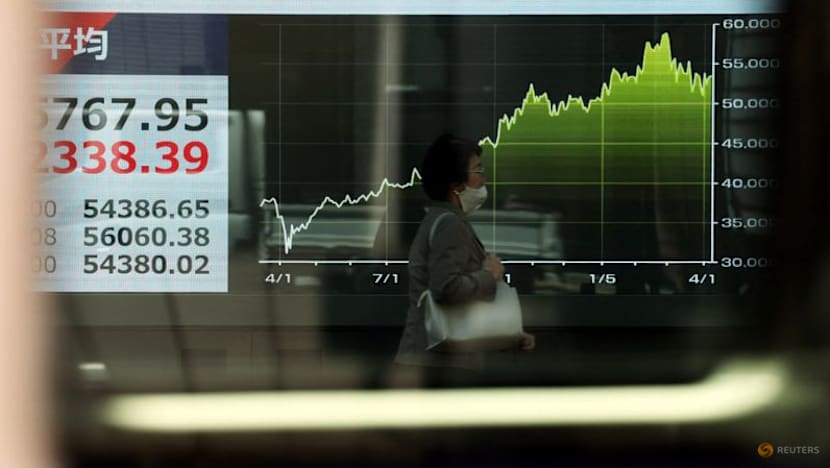 Asian shares pulls back from record highs as oil gains on Iran risk