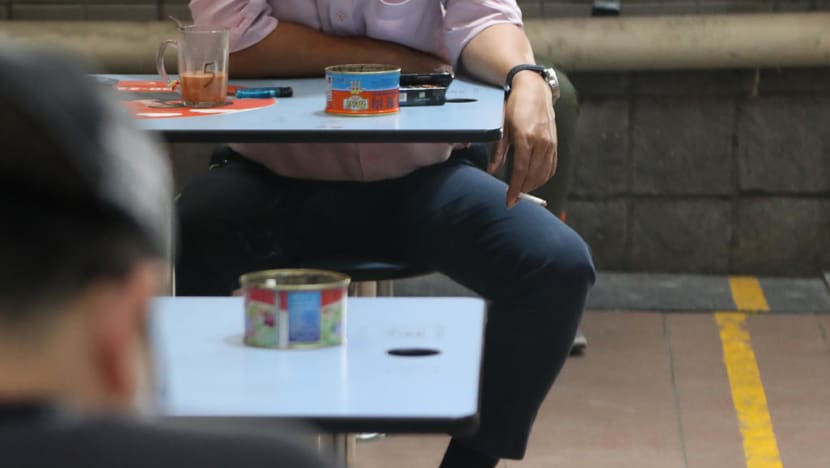 Man who spat at coffee shop staff for rejecting his 5-cent coins fined S$1,000