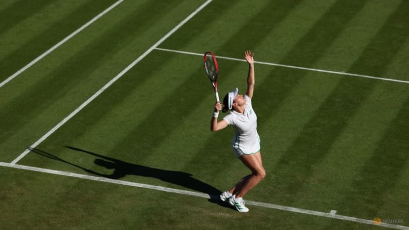 Keys keeps eye on the ball to reach Wimbledon second round