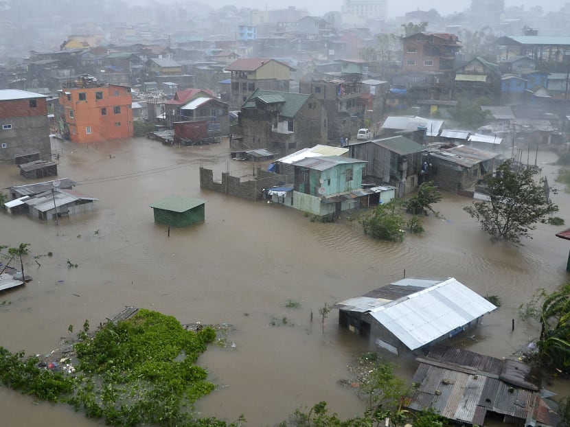 Typhoon leaves 11 dead, Filipino villagers saved from flood