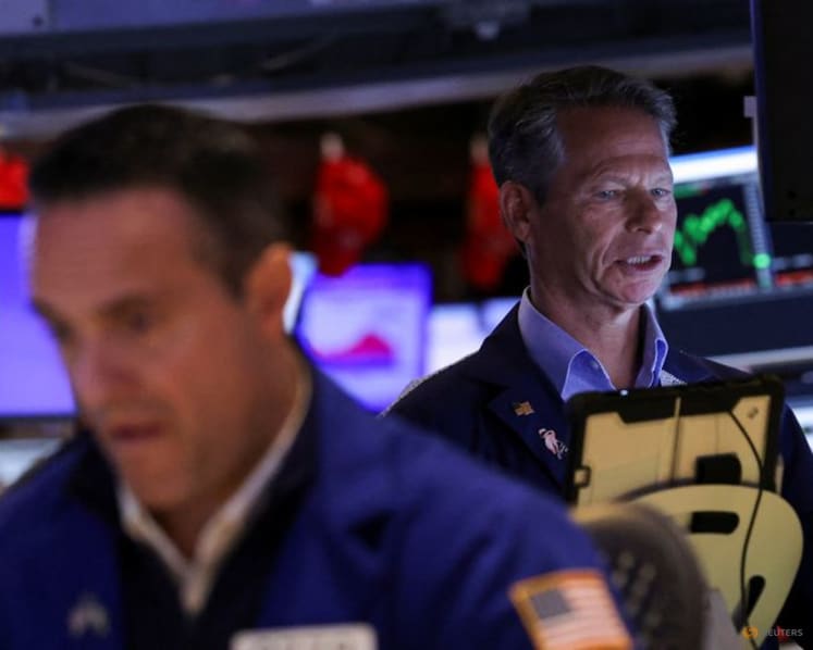 Stocks mixed, gold hits record as US government shuts down