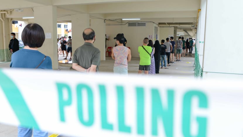 GE2020: Voters throng polling stations in the morning, with Covid-19 safety measures adding to the wait