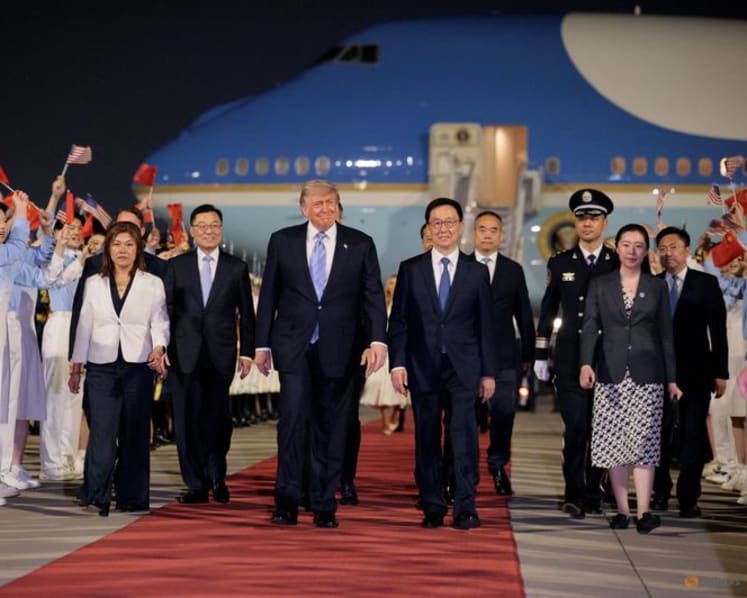 Trump lands in China ahead of high-stakes summit with Xi