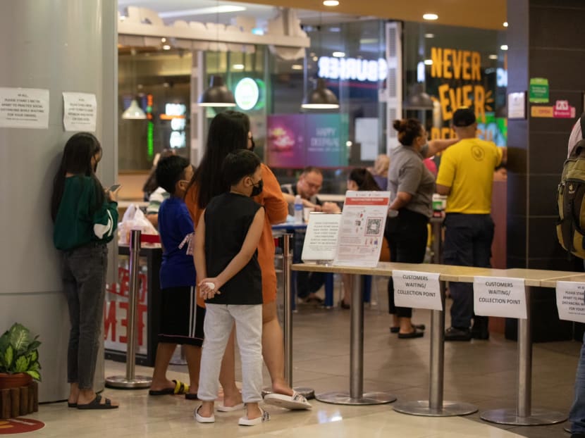 Five fully vaccinated members of the same household are allowed eat together at food-and-beverage establishments. The rule does not apply to coffee shops or hawker centres.