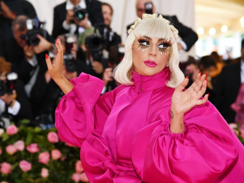 Three men were charged in Los Angeles in connection with the violent theft of two of singer Lady Gaga’s French bulldogs. Her dog walker was shot.